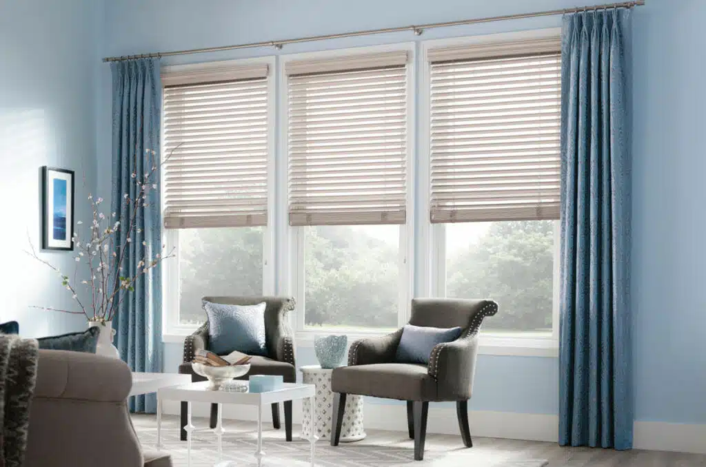how-to-layer-1 Simple, sturdy blinds pair nicely with patterned drapes for a clean and elegant look.