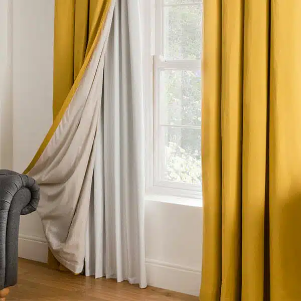 blackout-curtains Blackout curtains attempt to block all light from entering the room