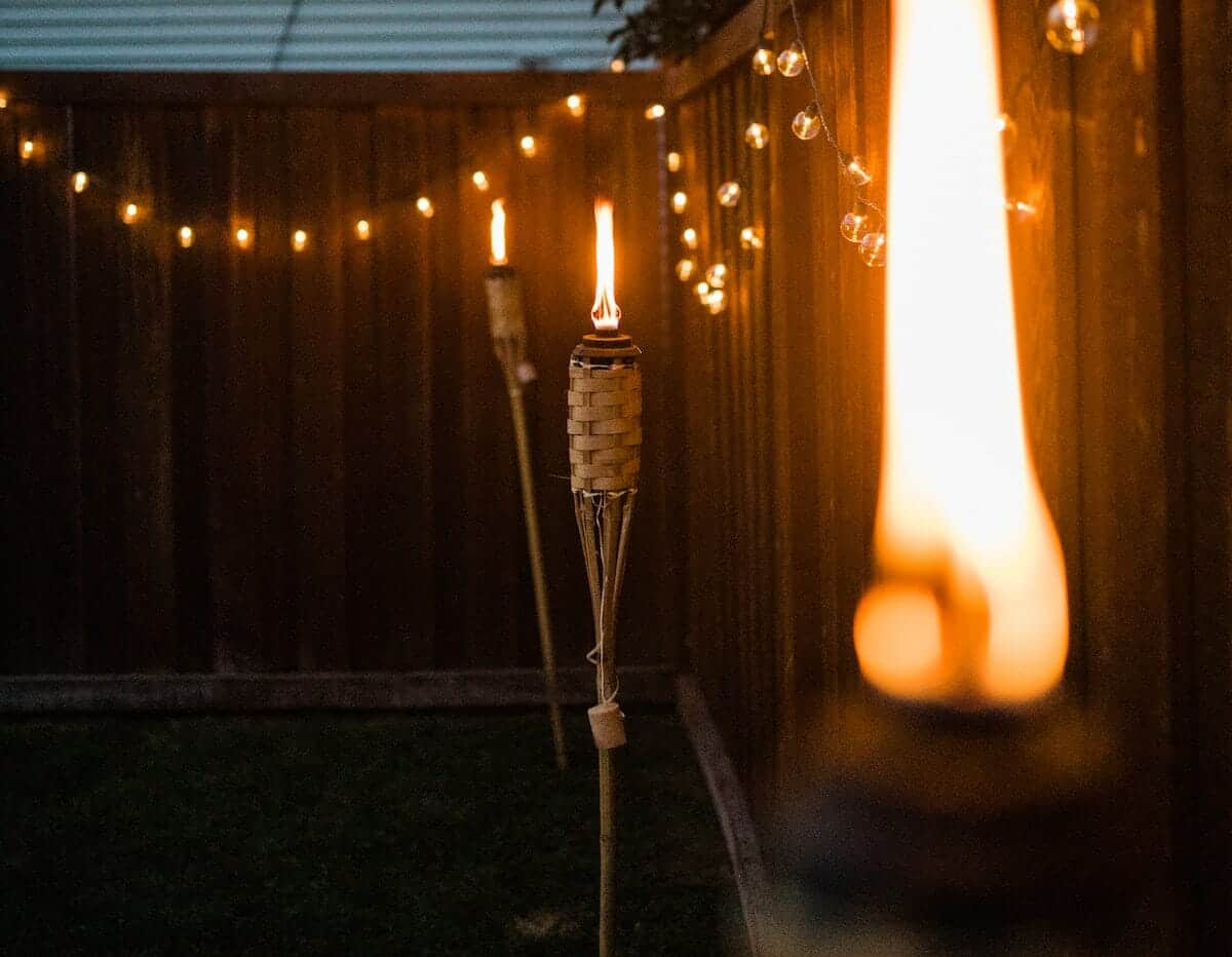 Add string lights and torches for an awesome backyard experience