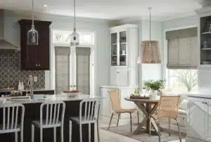 Roman shades tend to work better than a curtain or full drapes in kitchens where there are likely to be a lot of spills or splatters. Roman shades tend to work better than a curtain or full drapes in kitchens where there are likely to be a lot of spills or splatters.