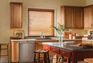Because kitchen windows are near food preparation areas, faux wood blinds make it easy to wipe down and are durable. Because kitchen windows are near food preparation areas, faux wood blinds make it easy to wipe down and are durable.