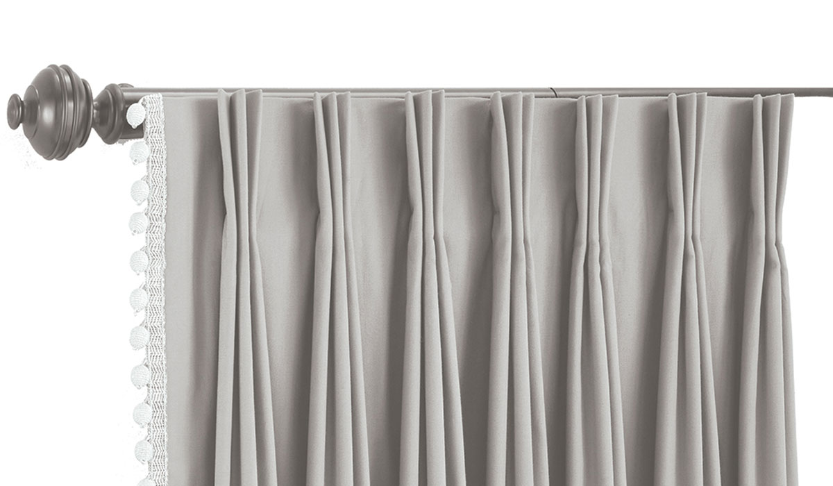 picture of light grey curtains with timeless pinch pleat gathering