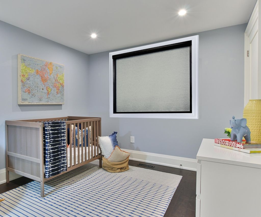 Norman Blackout Lightguard 360 window treatment in a babies room.